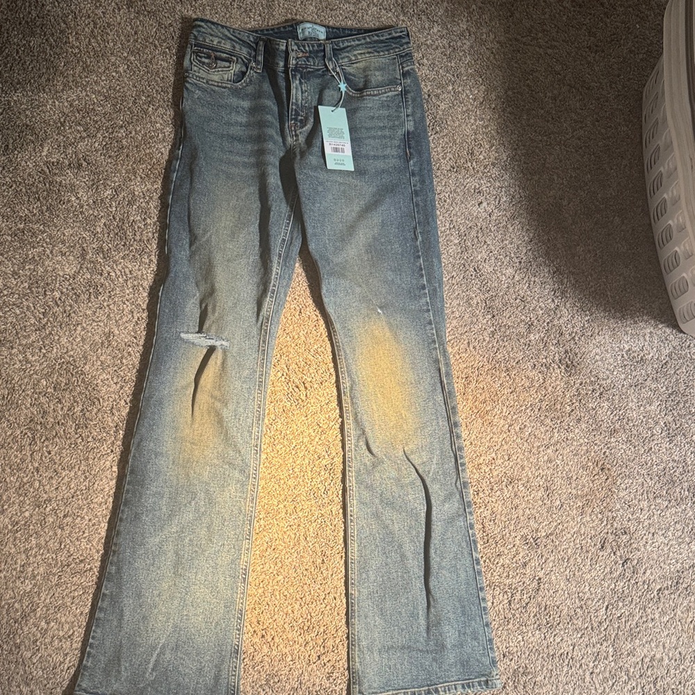 REVICE Blue Flare Jeans with Knee Distress